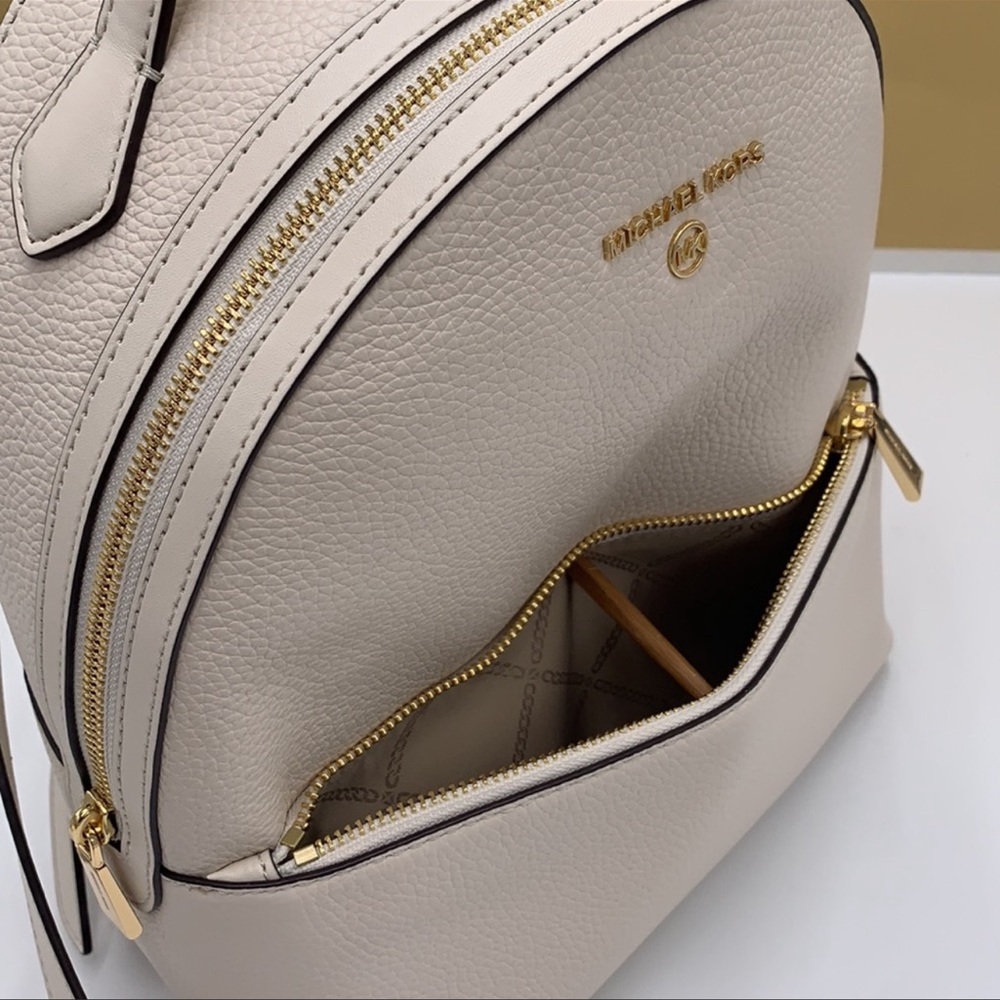 Michael Kors Women's Valerie Medium Pebbled Leather Backpack
Light Cream 
NWT - Picture 8 of 16